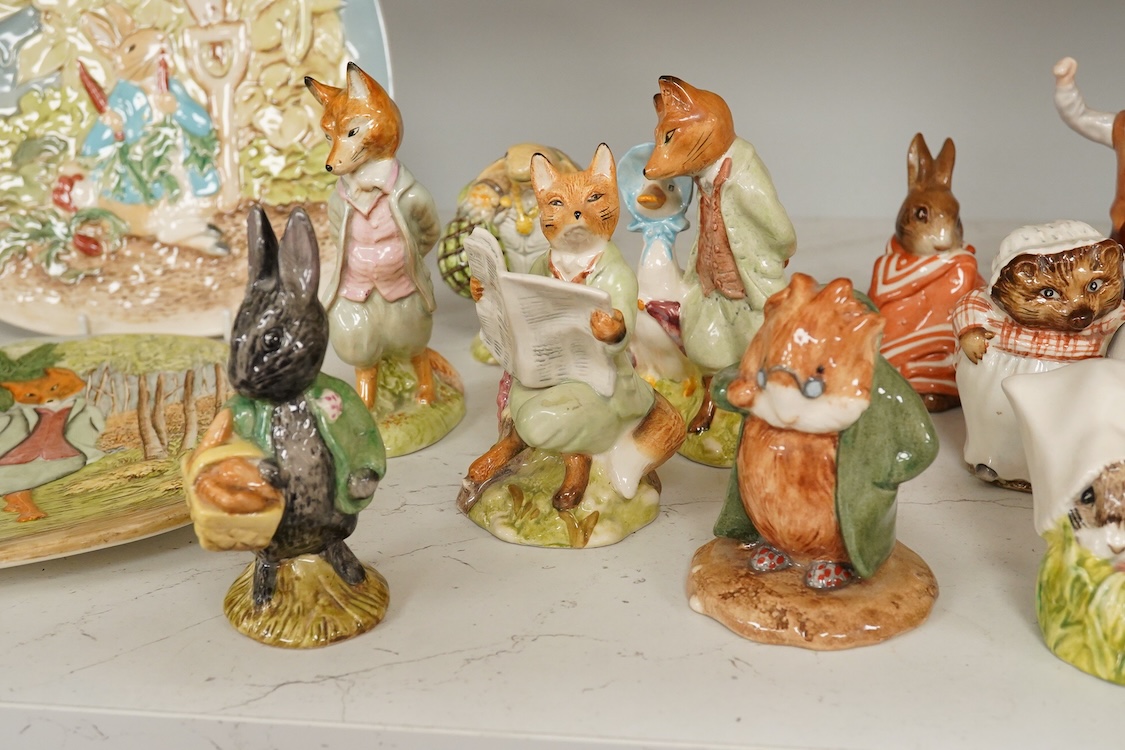 A collection of Beswick and Royal Albert Beatrix Potter figures to include Little Black Rabbit and The Head Gardener, together with two plates, 19cm wide
